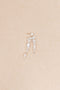 The Fontaine Nuit Earring by Sophie Bille Brahe is a statement drop earring with white freshwater pearls varying in size