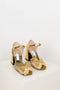 The 70's Strappy Sandals by Suzanne Rae are sturdy block heel sandals with 70s inspired straps across a front open square toe