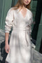 The Lucy Dress by Xirena is a mid length button up dress in a soft summer linen