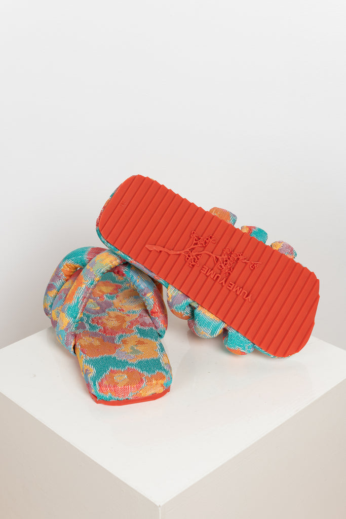 The Tyre Slides by Yume Yume are relaxed slides with chunky straps inspired all over the front foot in this season's signature floral print