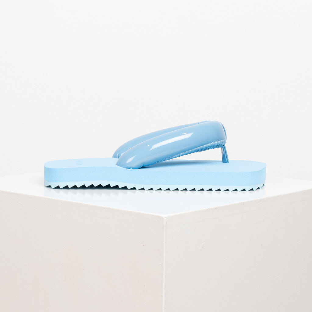 The Suki Slides by Yume Yume are relaxed fit flip flop slides with chunky straps inspired by the iconic Japanese Geta shape